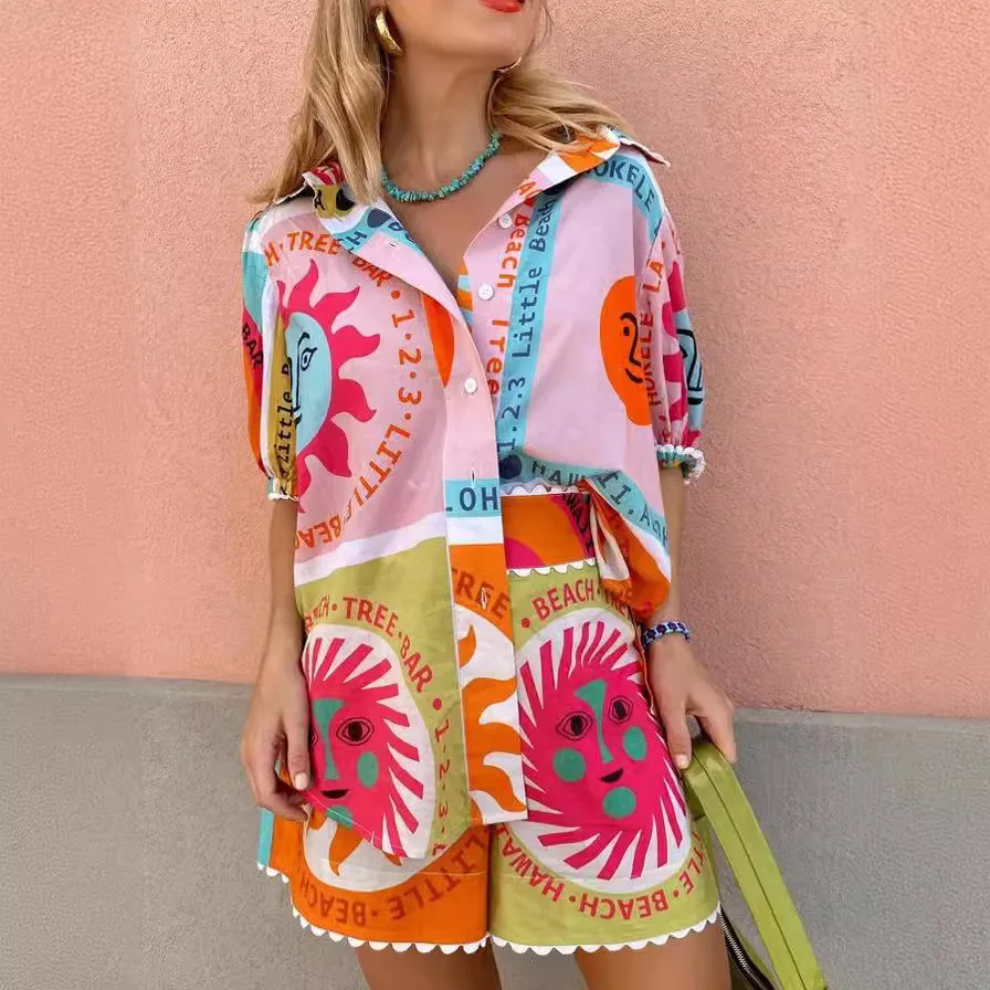 

Ins Summer Vacation Europe Women Cute 2 Piece Sets Pink Sun Face Graphic Button Up Shirts Polo Neck Chic Lace Short Pant Outfits