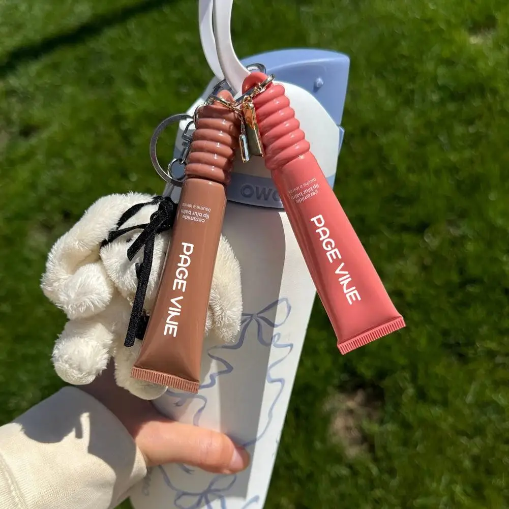 6 kolorów Balsam do ust z efektem masła Długotrwałe nawilżenie Błyszczyk do ust Ceramidowy, błyszczący, jedwabisty, lustrzany, przenośny, elegancki design z zawieszką Szminka