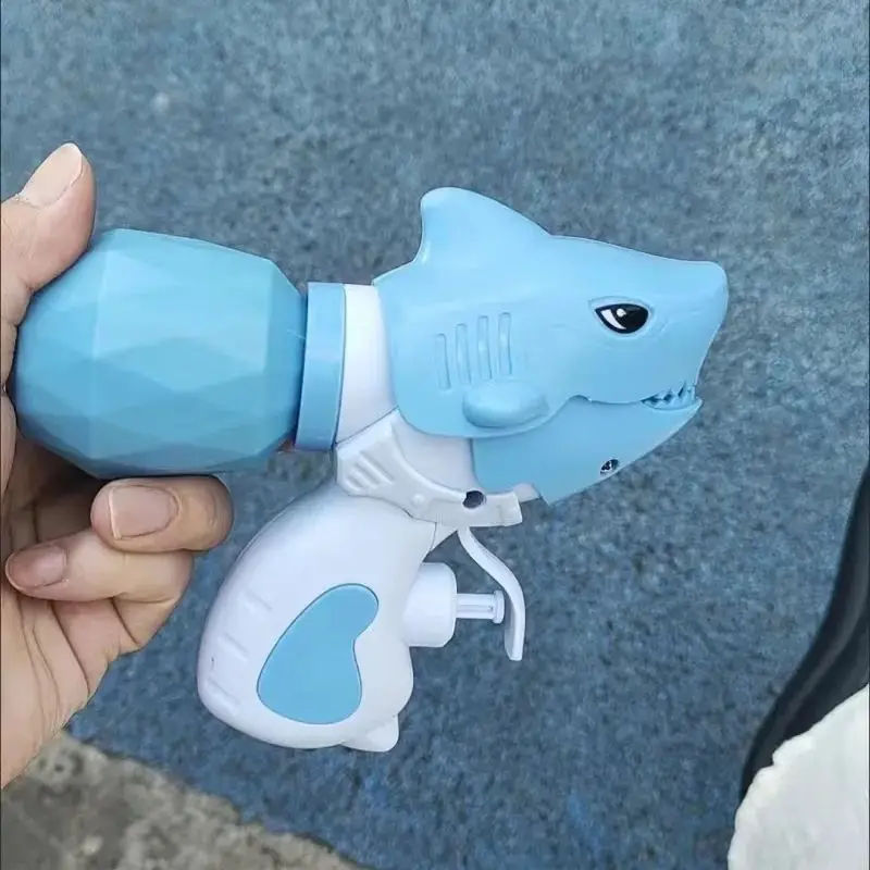 Mini dinosauro squalo pistola ad acqua piscina estiva giocattoli da spiaggia pistola giocattolo per bambini spruzzi d'acqua festival pistola ad acqua spray
