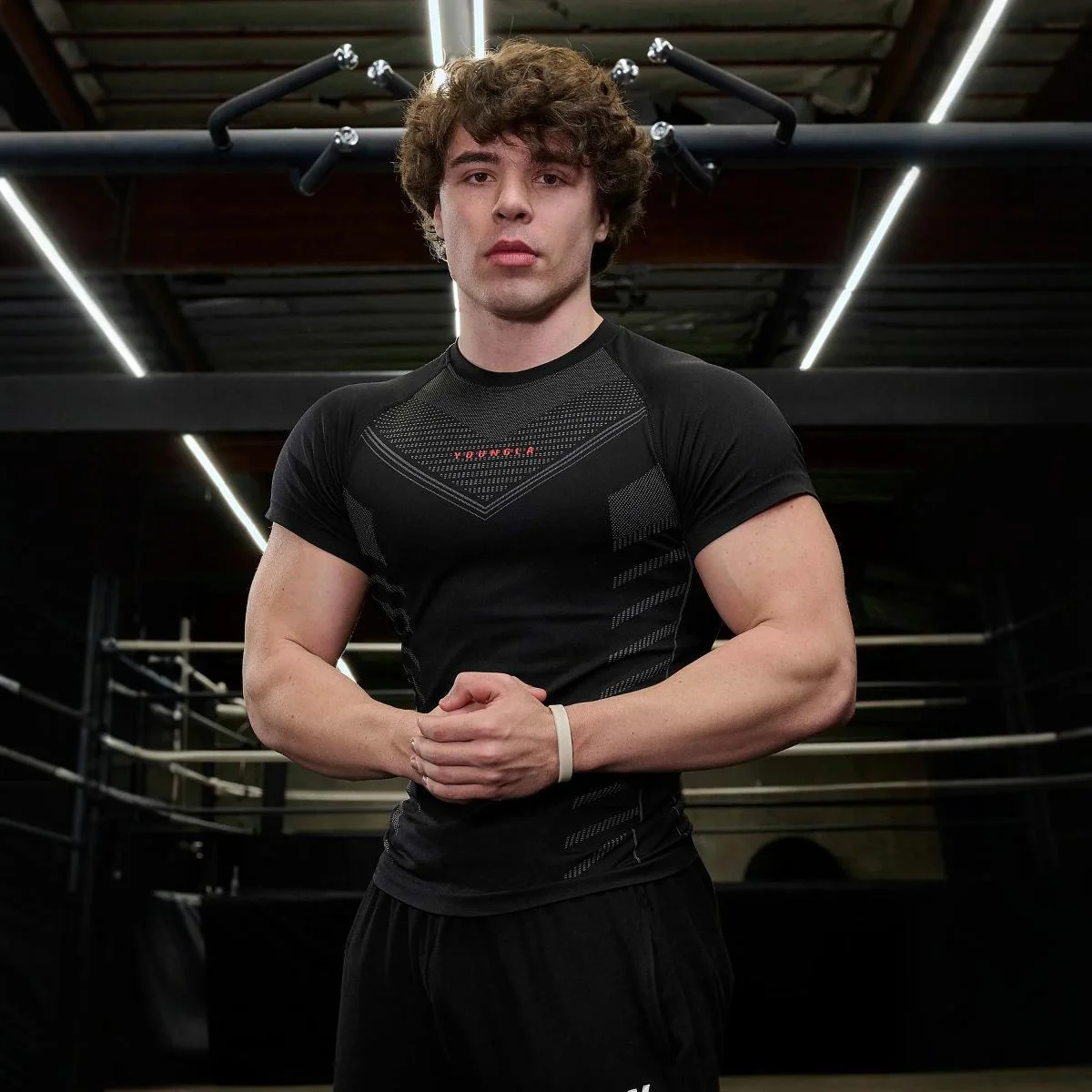 Nowe męskie t-shirty Fitness sportowy obcisła odzież Jogger siłownia kulturystyka Fitness bieganie trening Top z krótkim rękawem