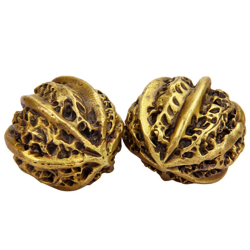 objets-de-loisirs-portatifs-en-cuivre-et-noyer-balles-de-fitness-de-la-marque-ancient-charm-studio-adaptes-aux-personnes-agees-et-aux-seniors