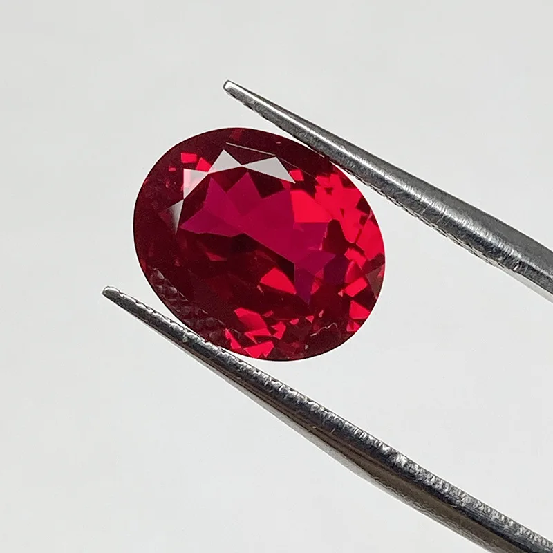 Jinglin Jewelry بالجملة طريقة الرفع المزروع حمامة الدم روبي البيضاوي حجر فضفاض جودة عالية في شهادة StockAGL