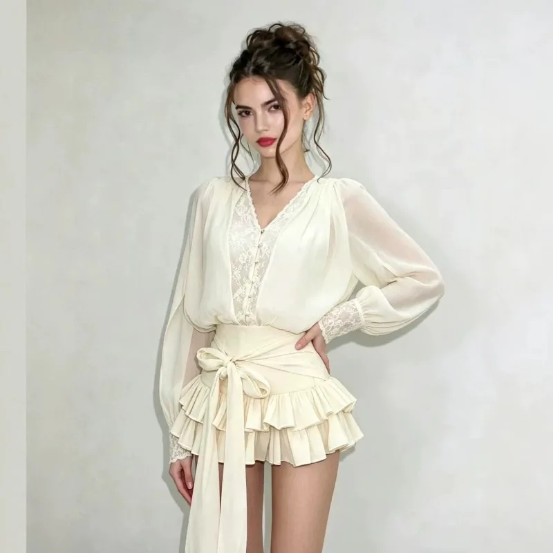 Fashionable sexy girl long-sleeved waist-cinching bow high-waisted puffy short skirt