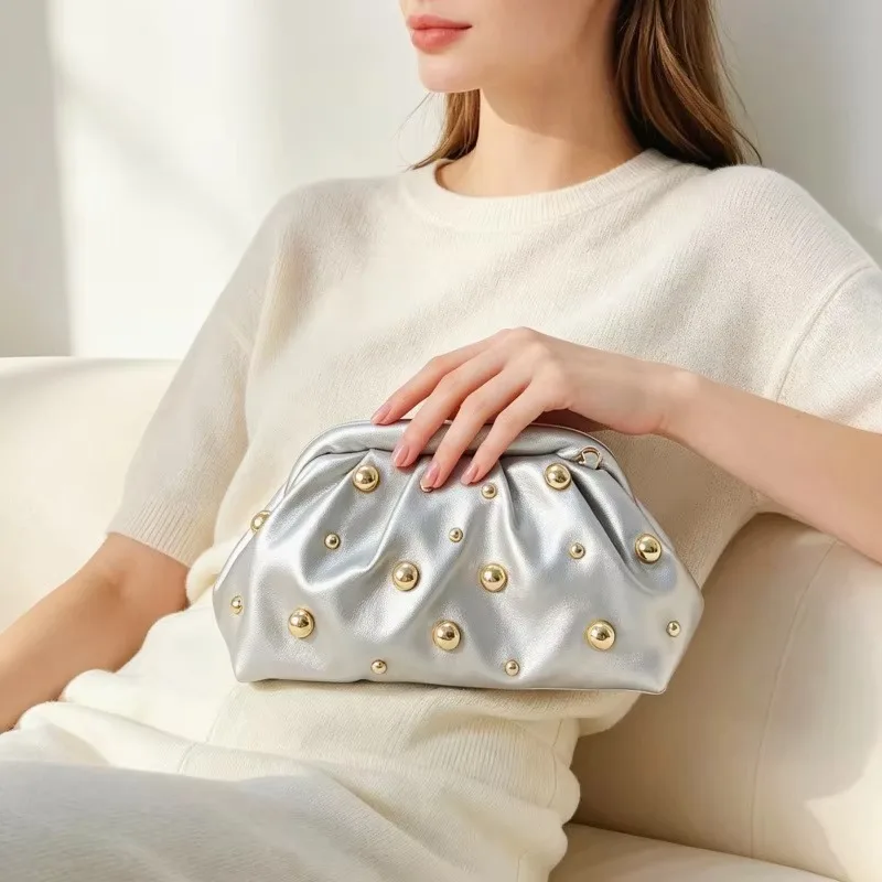 Trend fashion clutch bag new personalized foreign style rivet messenger bag Korean version casual commuter women's bag