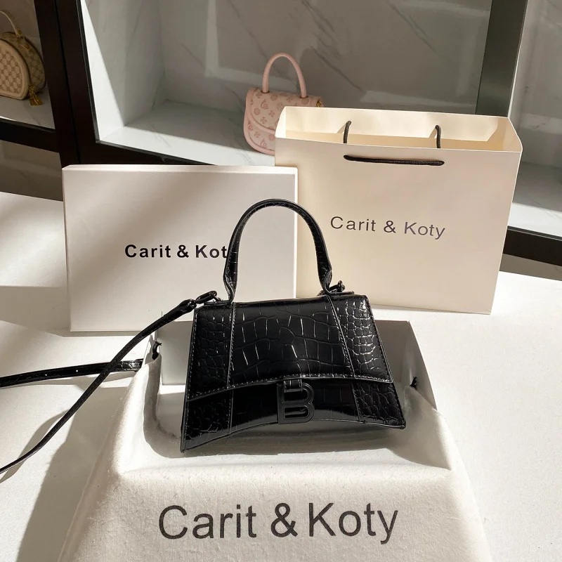 

Elegant crocodile pattern hourglass bag, versatile for autumn and winter, can be worn as a shoulder bag, crossbody bag, or handb