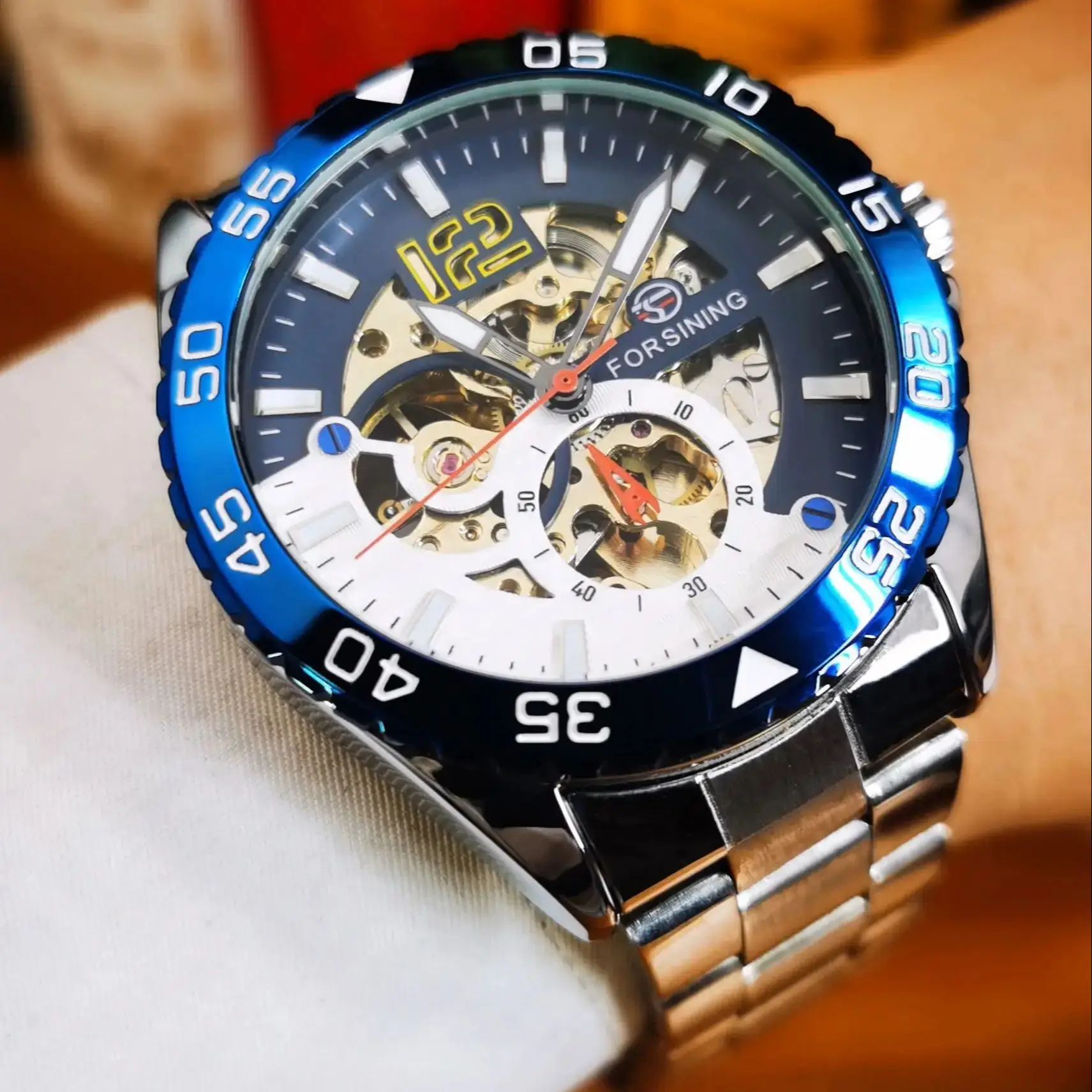 

Forsining Business Skeleton Watch for Men Blue Bezel Stainless Steel Strap Fashion Sports Automatic Mechanical Mens Watches 2026