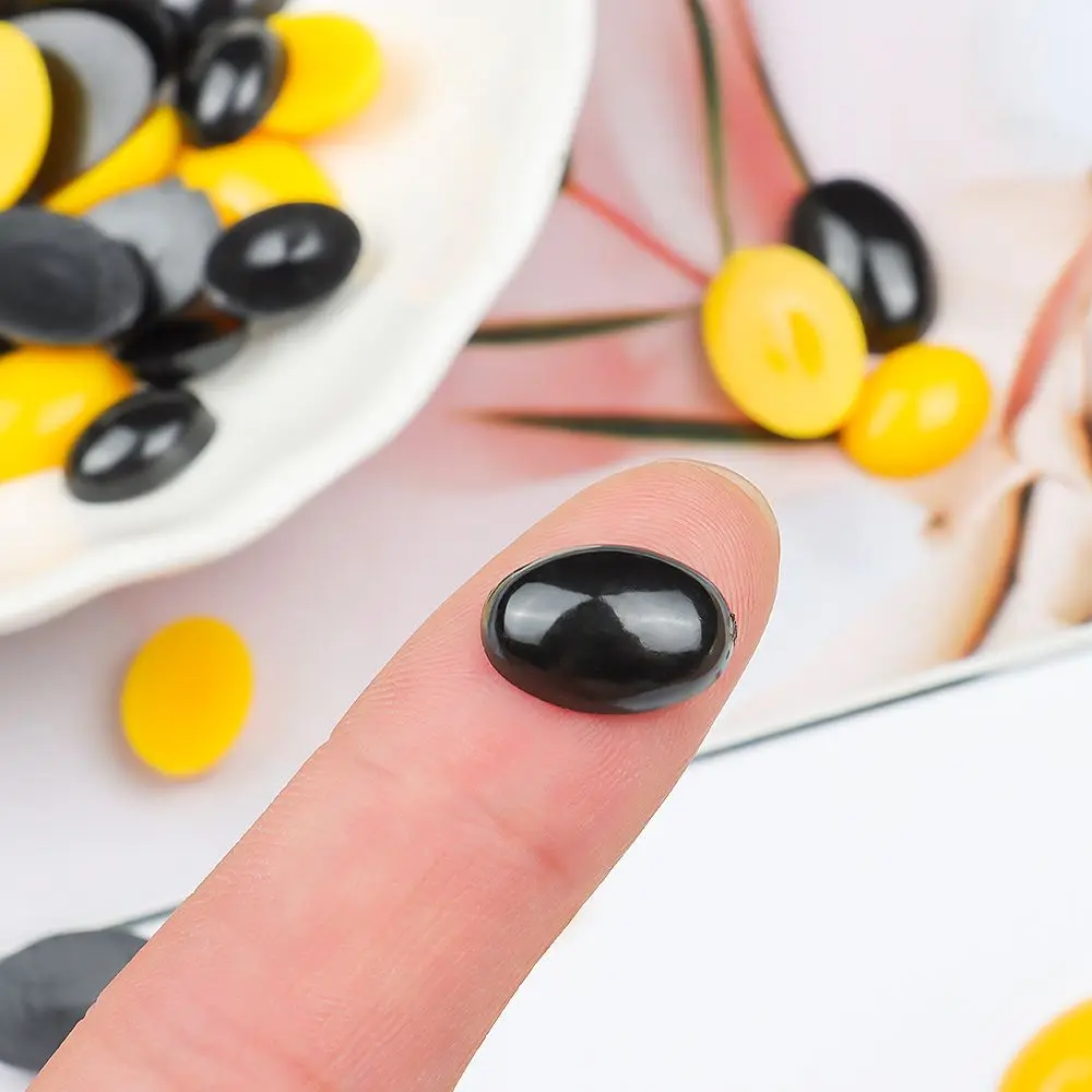 จมูกแบนปลอดภัยสำหรับตุ๊กตา 100 ชิ้น จมูกแบนพลาสติกทรงรีสำหรับตุ๊กตา สีดำ/เหลือง ตาพลาสติกปลอดภัย