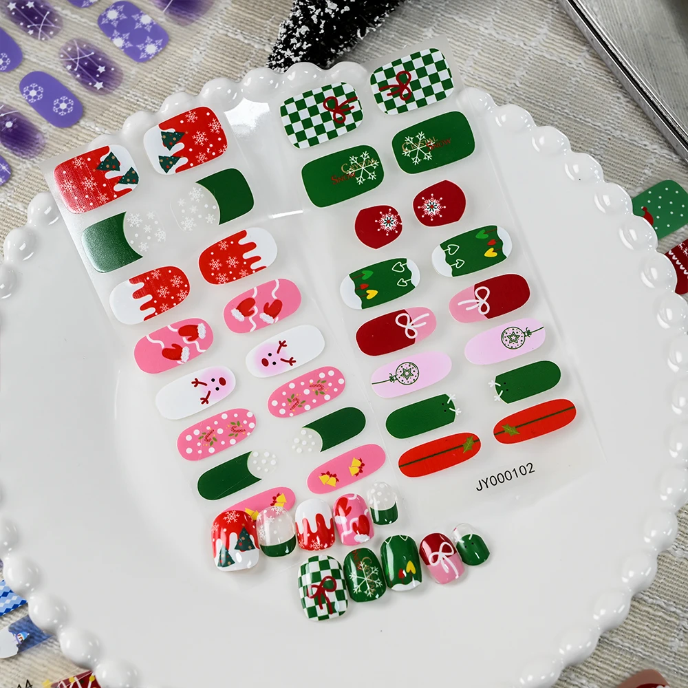 16 punte colorate cartoni animati natalizi adesivi per nail art carino copertura completa stampa sulla decorazione delle unghie adesivo decalcomania per unghie involucri per unghie di Natale