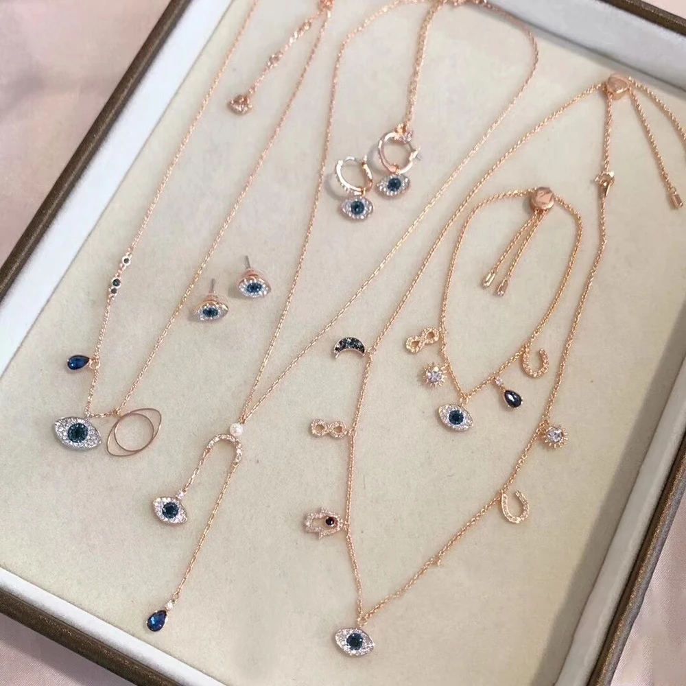 

Великолепный комплект украшений в форме глаза со смешанными камнями, паве и градиентным золотистым покрытием — идеально подходит для повседневного ношения