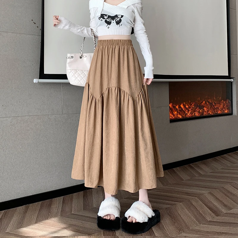 Half length skirt for women in autumn, with a high waist and a drooping feeling. A-line skirt, mid length and large swing skirt