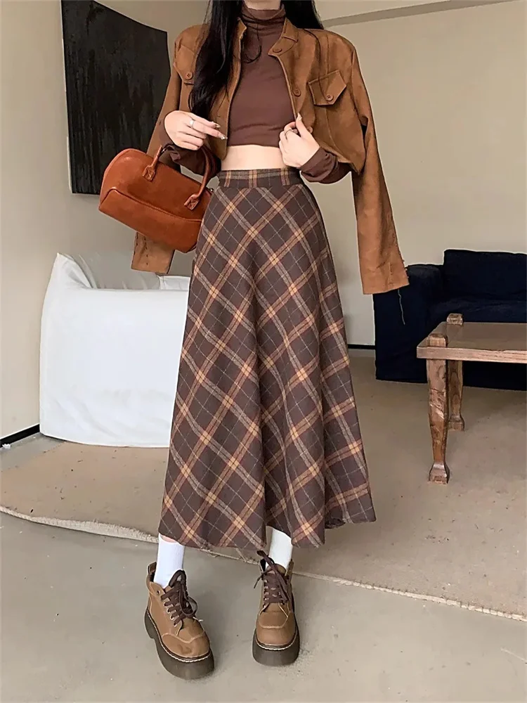تويد منقوشة عالية الخصر نصف الجسم تنورة الإناث الخريف والشتاء جديد ريترو فضفاض ساحات كبيرة الترفيه طويلة ألف خط نصف الجسم تنورة