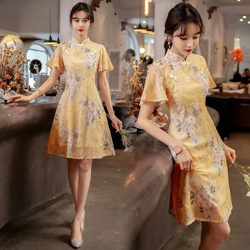 

Chinese traditional plaid women's summer improved young ethnic style embroidered flower short sleeved bizarre clothing