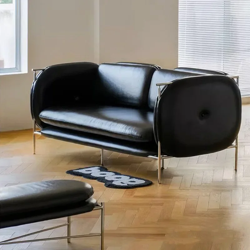 Black leather sofa three-person stainless steel sofa light luxury small apartment clothing store designer sofa