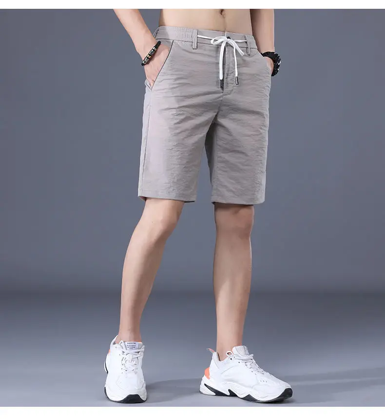 

Cool Breathable Ice Silk Casual Men Summer Thin Korean Version Versatile Loose Elastic Waist Drawstring Beach Five-point Pants