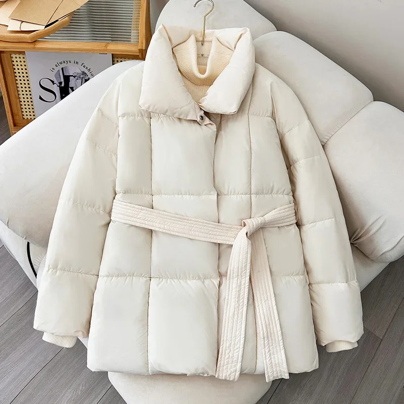 Korean Version of The New Medium Long Loose Stand Collar Down Jacket with Belt, Women Winter Solid Color Warm Zipper Padded Coat