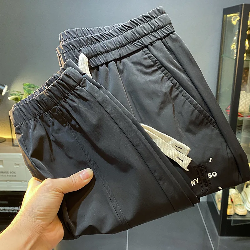 

Ice Silk Casual Pants Men's Summer2024New Ultra-Thin Ankle-Tied Sports Pants Fashion Brand Quick-Drying Cool Long Pants