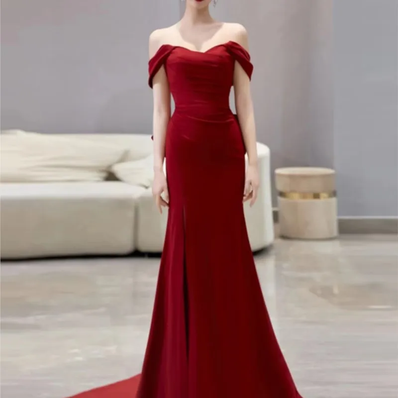 Toasting the new one-shoulder red fishtail dress