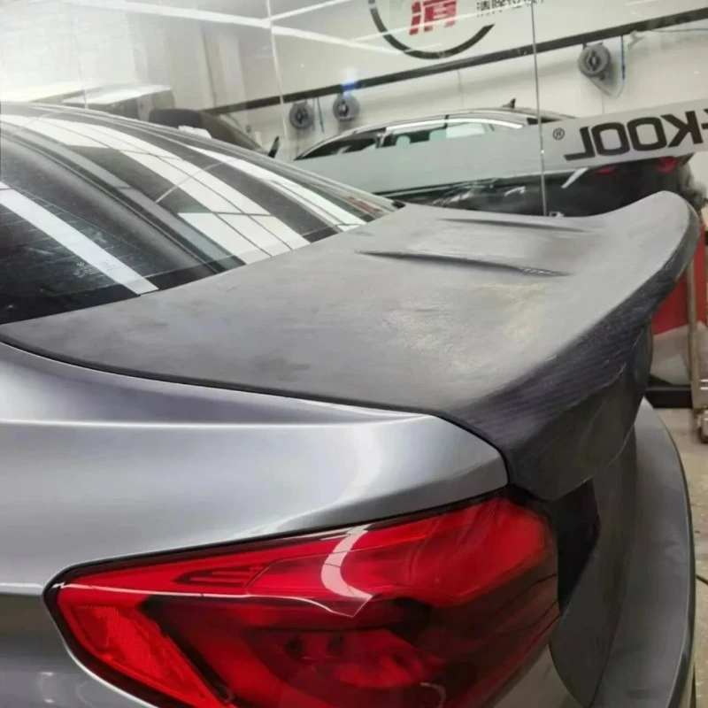 

Premium FORBMW G30/G38 F90 5 Series/M5 CSL Rear Trunk Cover Genuine Carbon Fiber