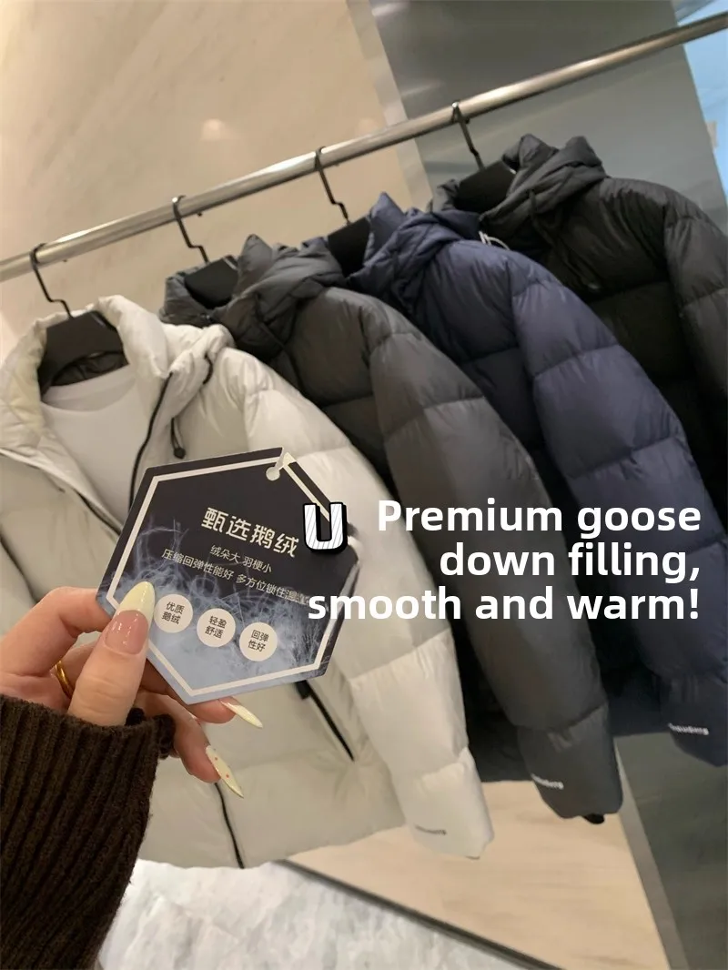 

Мужская зимняя пуховая куртка для активного отдыха с капюшоном, наполнителем из гусиного пуха, ветрозащитная, водонепроницаемая, теплая, стандартного кроя, с длинными рукавами, на молнии.