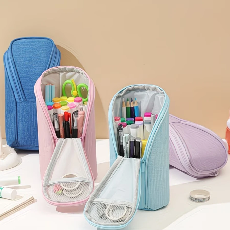 Large-capacity flip-top pencil case with vertical pen holder - multi-compartment organizer with mesh pocket and elastic buckle, soft blue/pink, durable desktop storage, space-saving design
