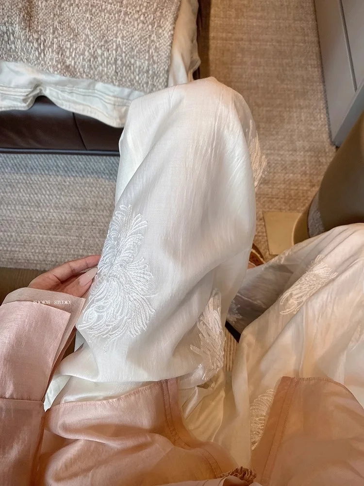 Pantaloni a gamba larga ricamati bianchi Pantaloni estivi larghi dal taglio dritto da donna Nuovi pantaloni casual cinesi Sle Pendolari Sle