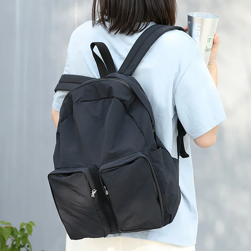 Lightweight traveling Nylon backpack Solid Color large bags for women Minimalist girls school bag college bag with zipper