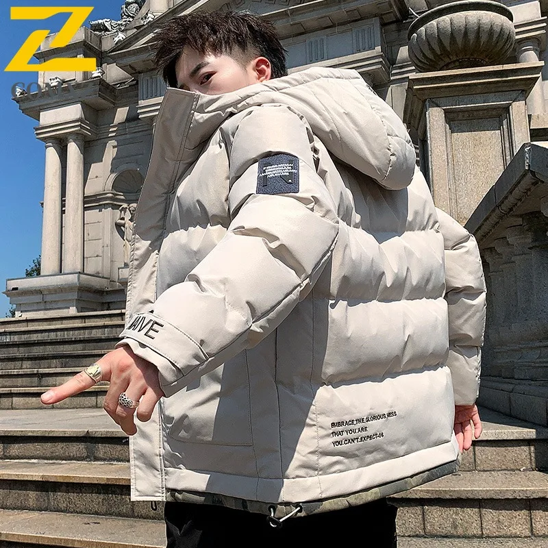 COMXZ 2025 ใหม่บุรุษฤดูหนาวเสื้อแจ็คเก็ตผ้าฝ้ายสไตล์เกาหลีแฟชั่นเสื้อแจ๊กเก็ตที่อบอุ่นกันน้ำและกันลมกีฬากลางแจ้ง