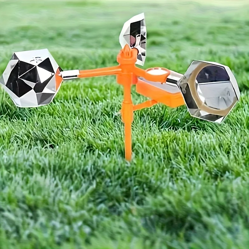 جهاز طارد الطيور العاكس الذي يعمل بالطاقة الشمسية مع صندوق صوت - برتقالي، مثالي للحدائق والمزارع والبساتين