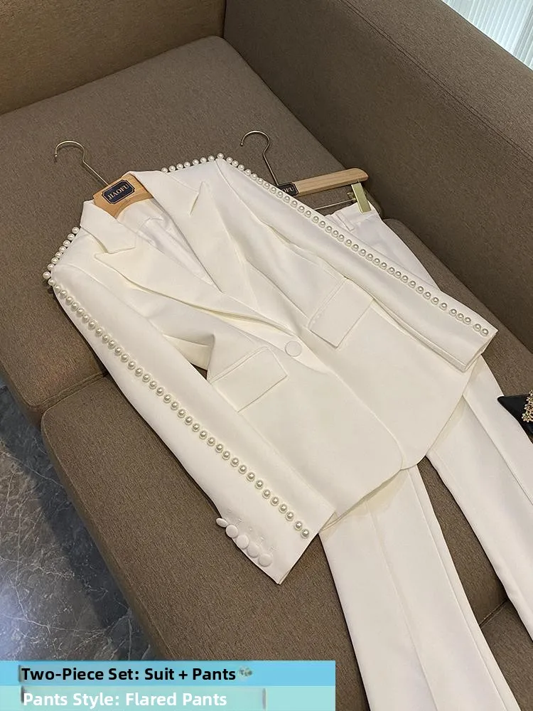 بدلة ميدي بيضاء علوية وبنطال ذو قصة أرجل واسعة طقم مكون من قطعتين ملابس نسائية قابلة للتجاعيد للأعمار من 25 إلى 35 عامًا صنع في الصين