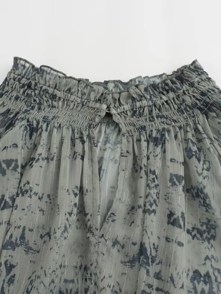 2025 Camicia a maniche lunghe ampia con stampa di linee di colore metallizzato alla moda in stile europeo e americano delle nuove donne