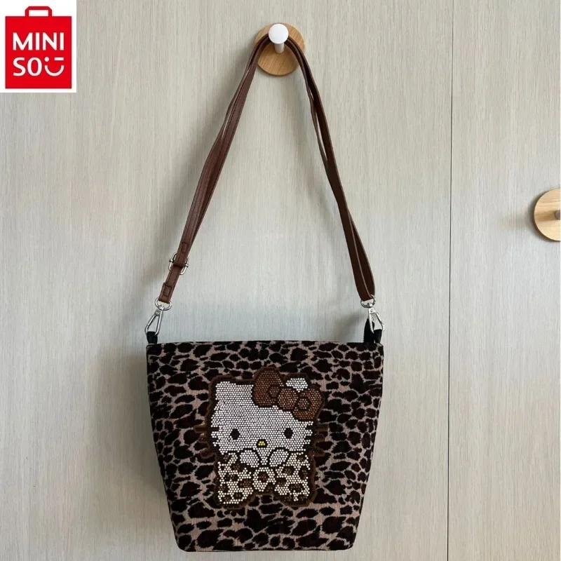 MINISO 2024 new cute cartoon sparkling diamond crossbody bag for women, multifunctional storage and versatile bucket bag