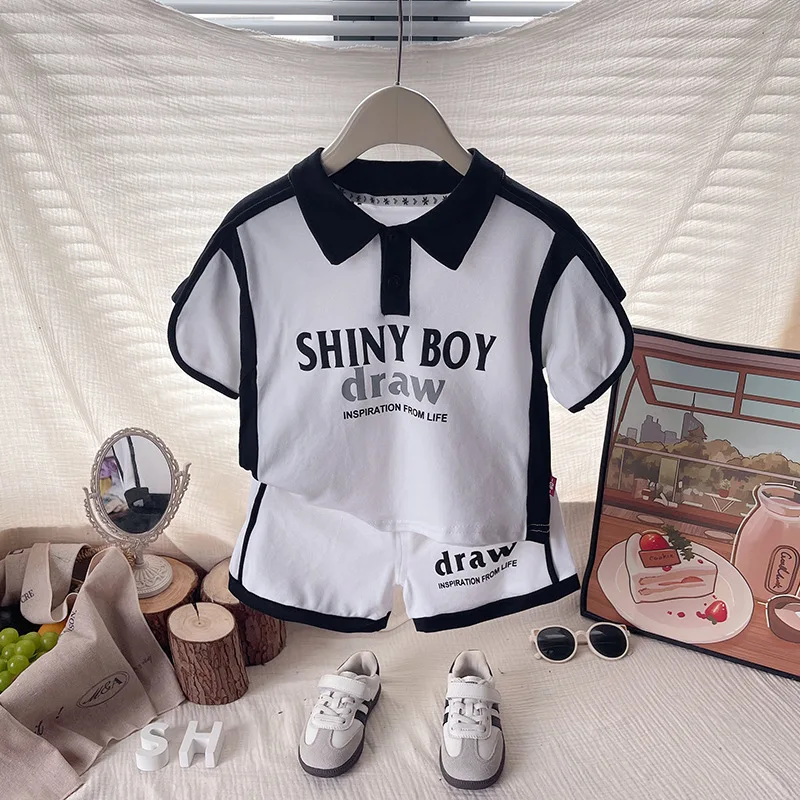 طفل رضيع بوتيك الملابس مجموعة 2026 الصيف أسود أبيض مختلط اللون قصيرة الأكمام تي شيرت والسراويل قطعتين ملابس الأطفال #1