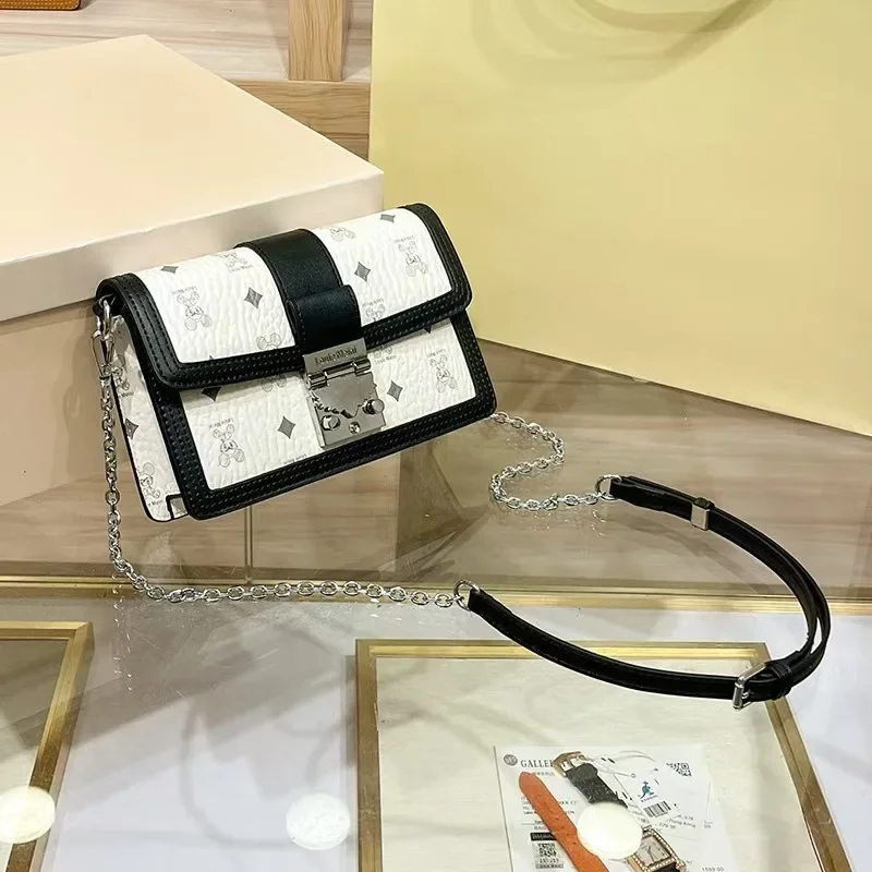 

2025 Durable Leather Handbags For Ladies By Famous Designer Featuring Crossbody Strap And Tote Handle