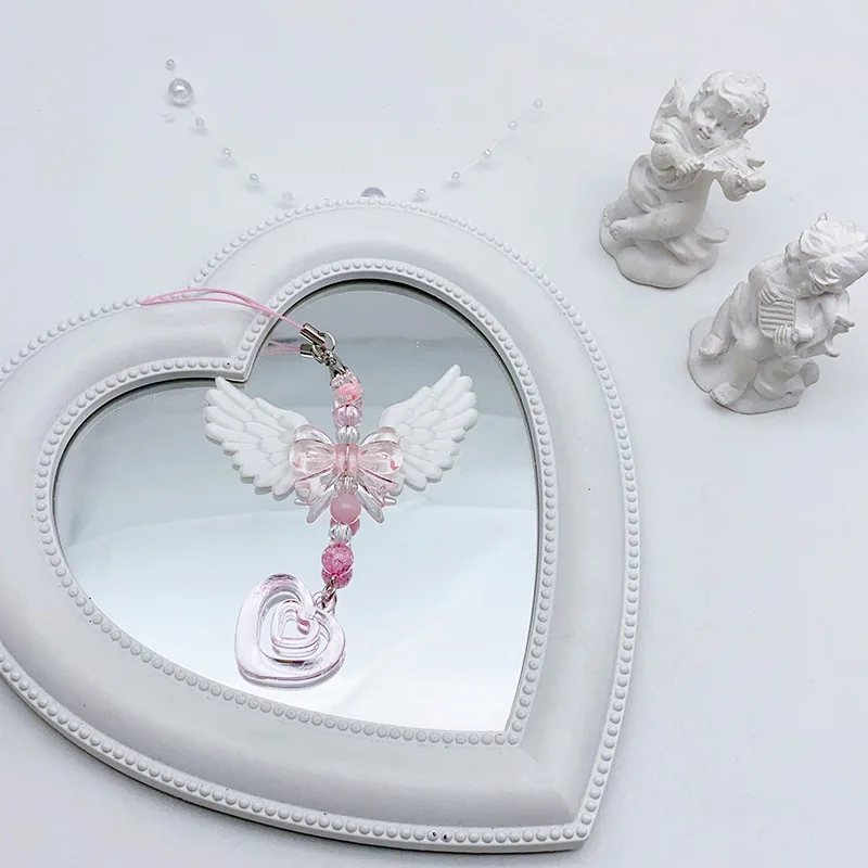 Novas lindas asas arco coração alça móvel pingente de telefone corrente para meninas mulheres doce chaveiro sacos acessórios decorativos presentes