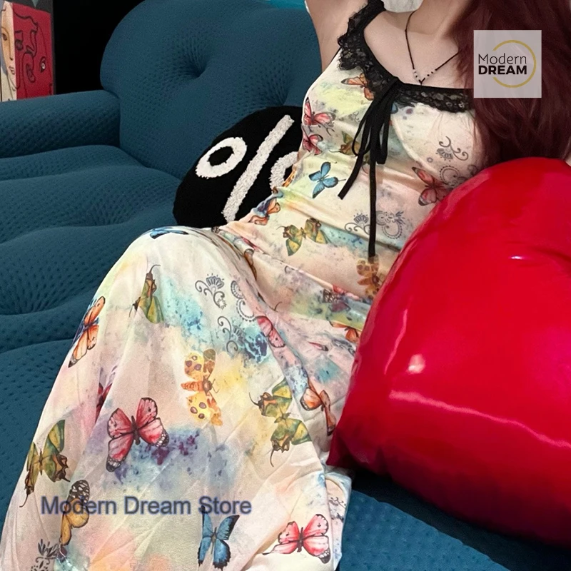 

New summer blooming butterfly sling dress female French fashion waist sweet girl holiday floral leisure gauze maxi dress
