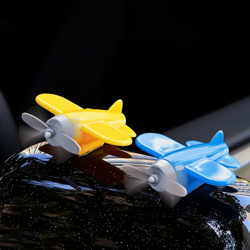 1Pcs Creative Cartoon Cute Turnable Small Plane Car Decoration Ornament Funny Helmet Electric Motorbike Ornament Fun Kids Gift