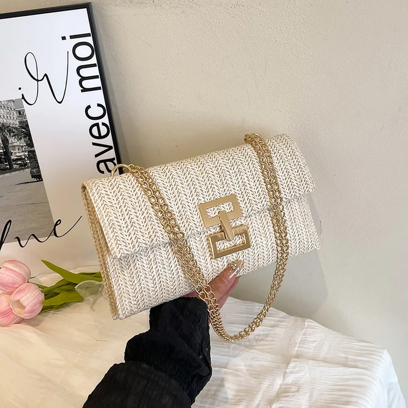 

Woven clutch bag clutch bag European and American fashion fringed bag straw envelope bag