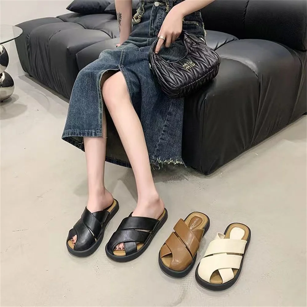 Baotou semi-slipper women wear pregnant women in summer, lazy people pedal office, Roman woven hollow muller shoes sandals.