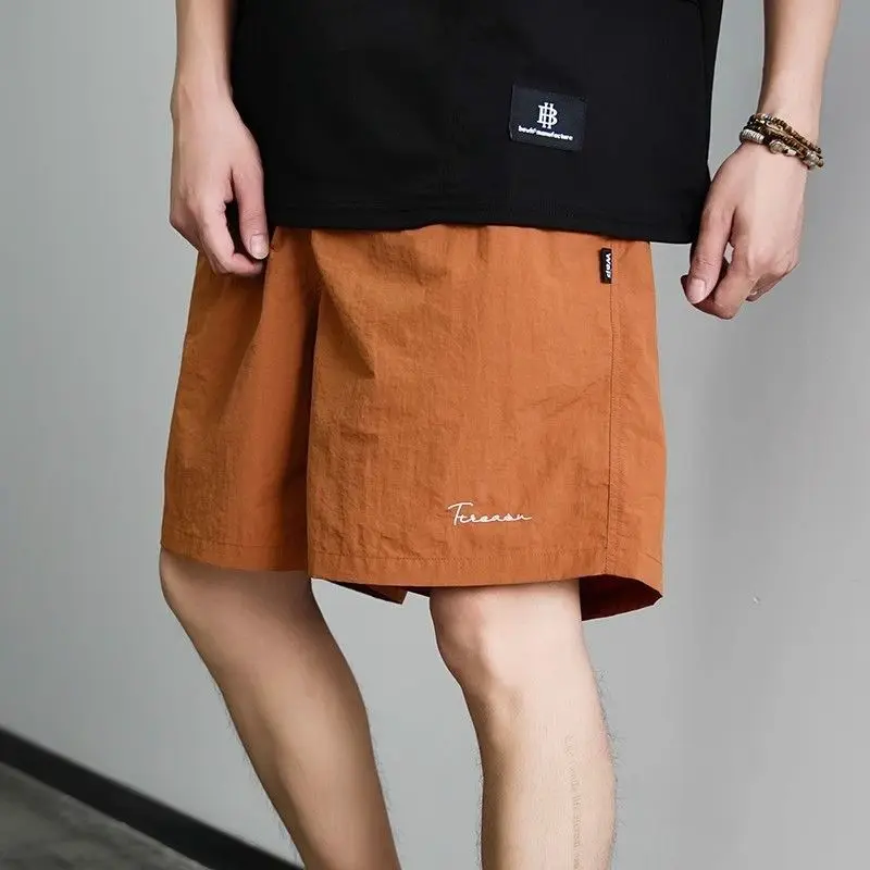 

Модные мужские летние шорты свободного кроя, прямые, длиной до колена, повседневные, спортивные, молодежные, быстросохнущие, тонкие, нейлоновые, цветные, для пар...