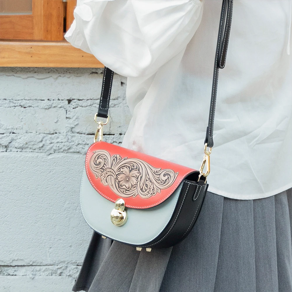 Vegetable tanned leather carved women's shoulder bag fashionable crossbody bag niche design retro saddle bag  for women