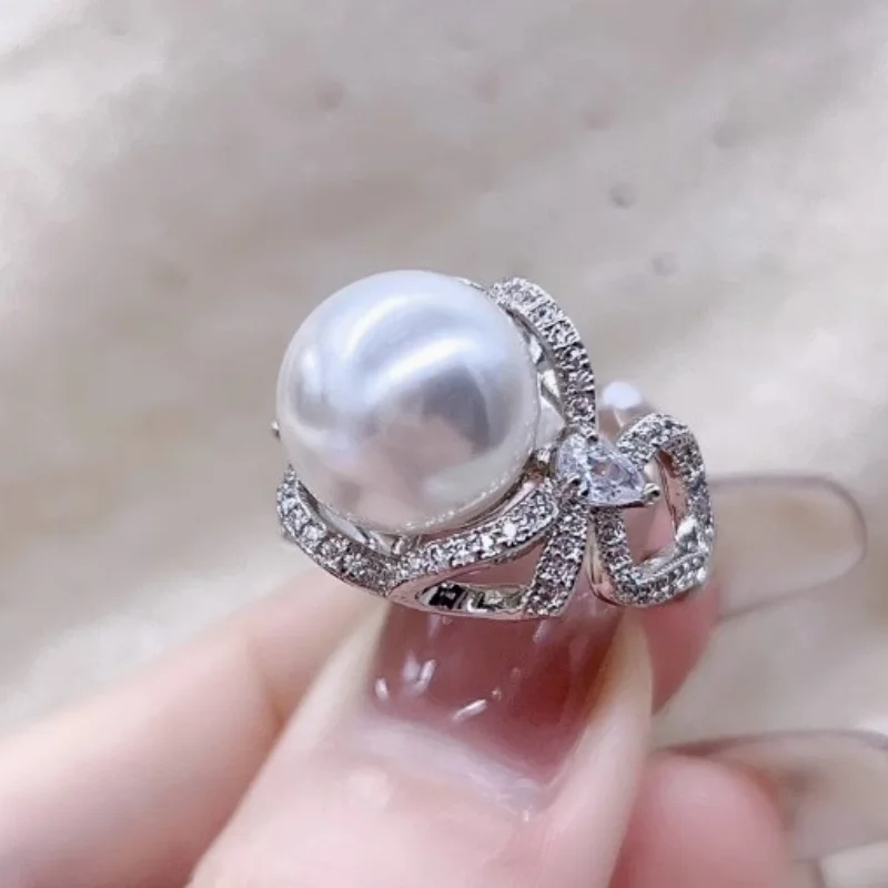 squisito-anello-con-perla-bianca-naturale-pura-aaaaa-10-11-mm-del-mare-del-sud-in-argento-925-con-apertura-regolabile