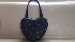 Borsa Lolita popolare borse a tracolla a cuore progettate alla moda ragazze adolescenti borsa a rivetto Chic 2024 autunno tutte le partite borsa uniforme