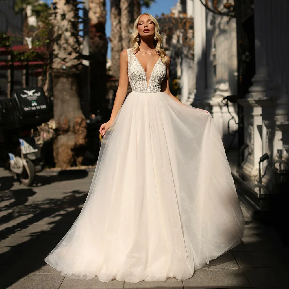 

Customized 2026 A-Line Boho Wedding Dress Deep V-Neck Sleeveless Lace Appliques Tulle Bridal Gown Women Backless Princess Dress