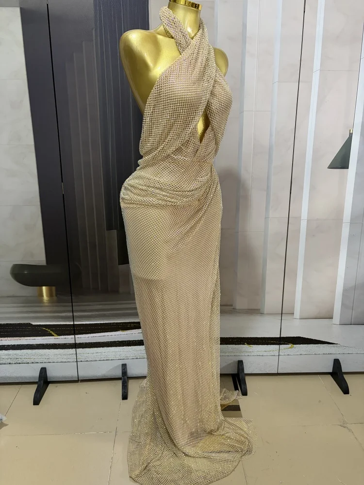High-quality new women's summer dress: a sexy, elegant, gold, sleeveless, long gown featuring a deep V-neck, cut-out details, an