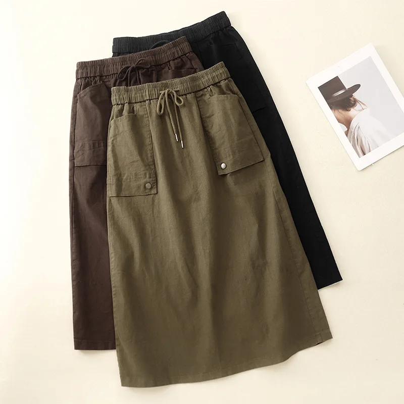 Modne koreańskie spódnice damskie na wiosnę i lato 2025, z dużymi kieszeniami, midi, eleganckie, z wysokim stanem, codzienne, elastyczne, uniwersalne.