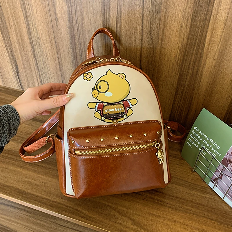 

fashion rivet backpack,cartoon bear backpack for women,all casual backpack for student,ladies classic backpack for pupil Girl