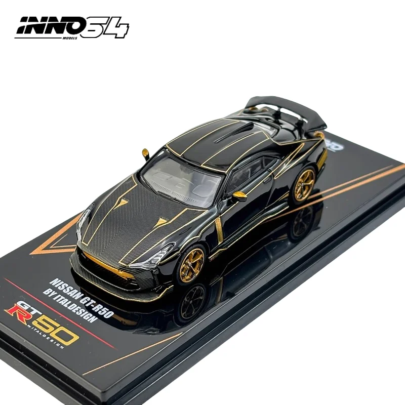 

In stock 1:64 NISSAN GTR 50th Anniversary die-cast simulation alloy car model, boys' festival gift toy, adult decorative item.