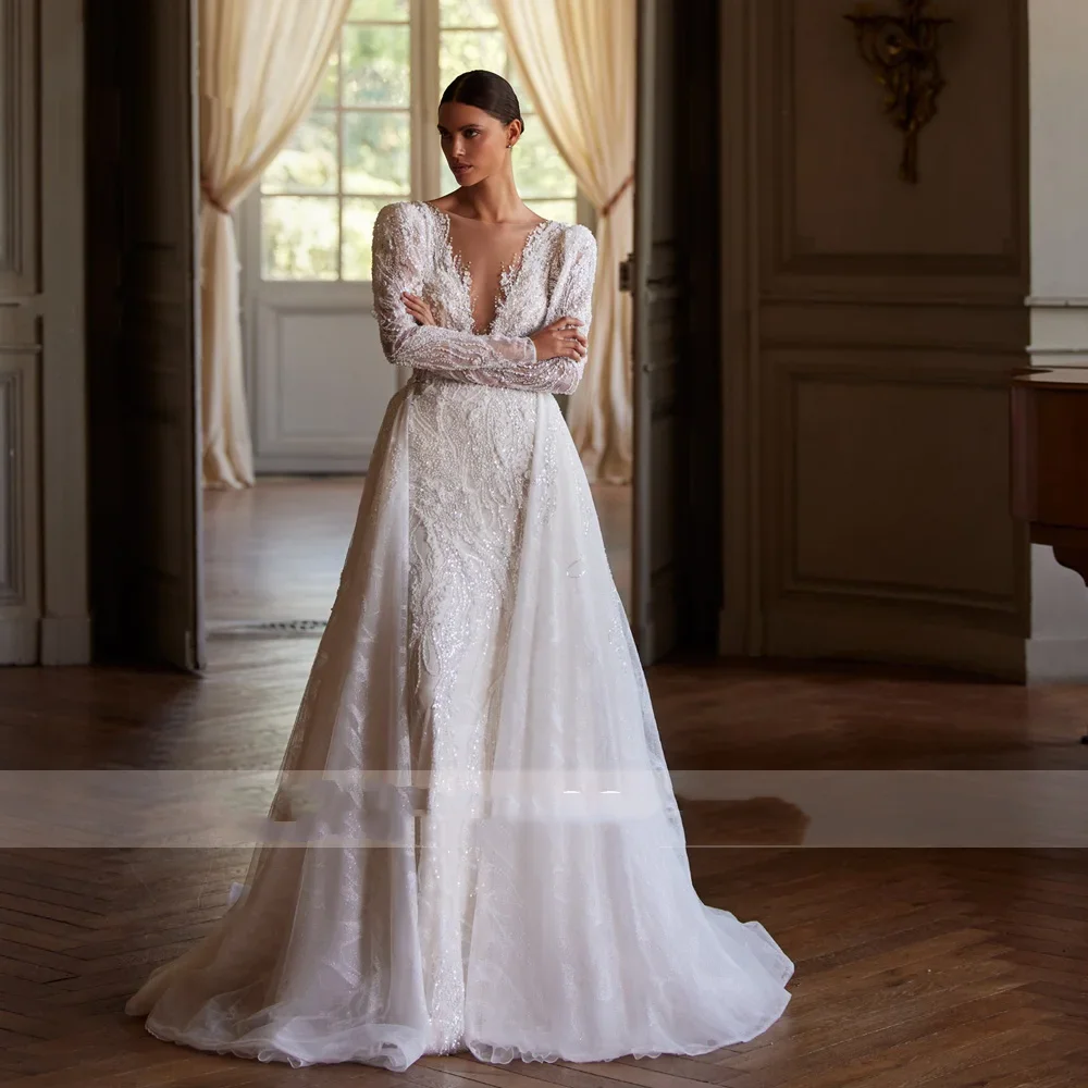 ชุดแต่งงานทรงเมอร์เมดแบบสั่งตัดของ Flavinke คอวี แขนยาว ปักลาย พร้อมกระโปรงแบบถอดได้