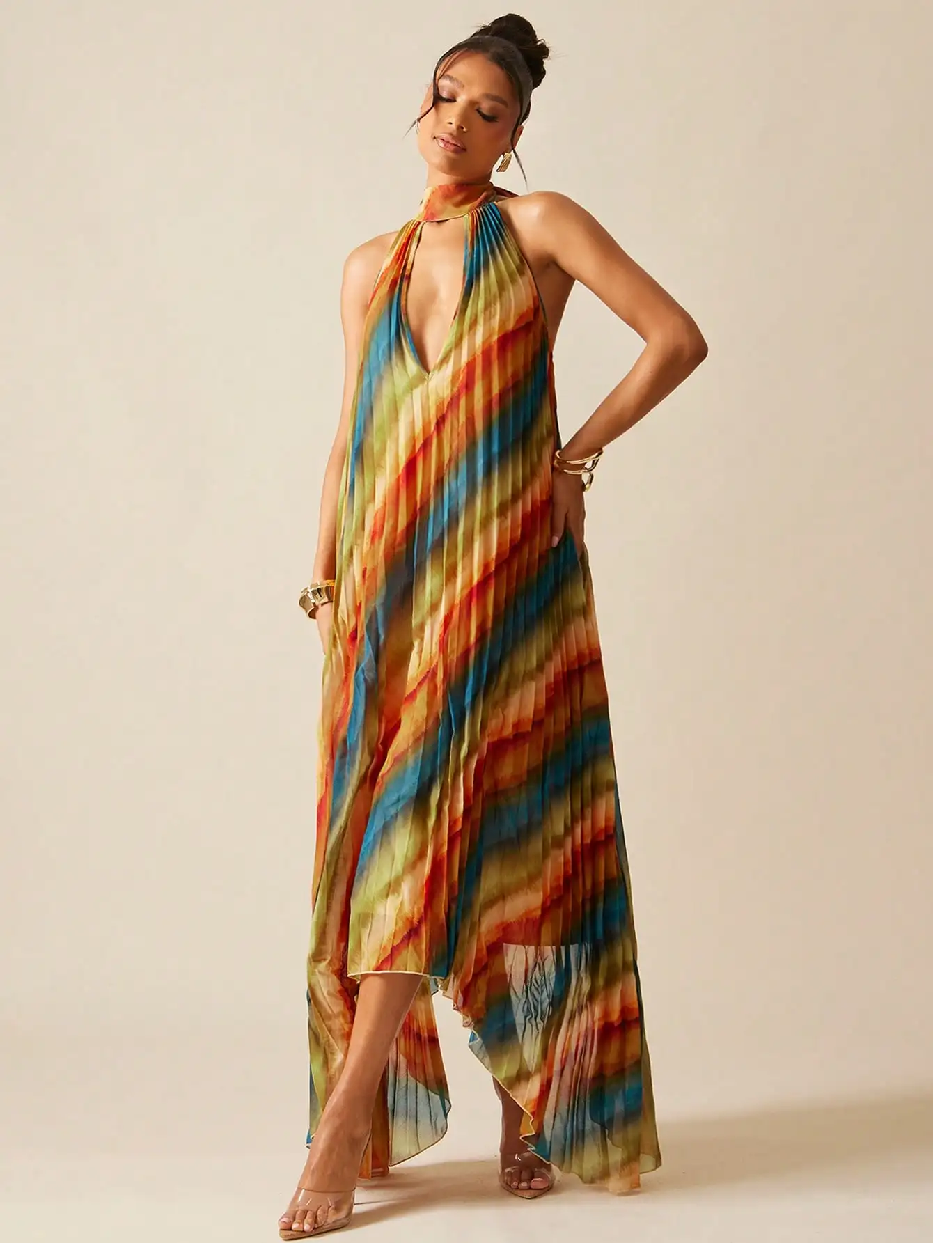 

Abstract Print Halter Neck Pleated Maxi Dress with Asymmetrical Hem