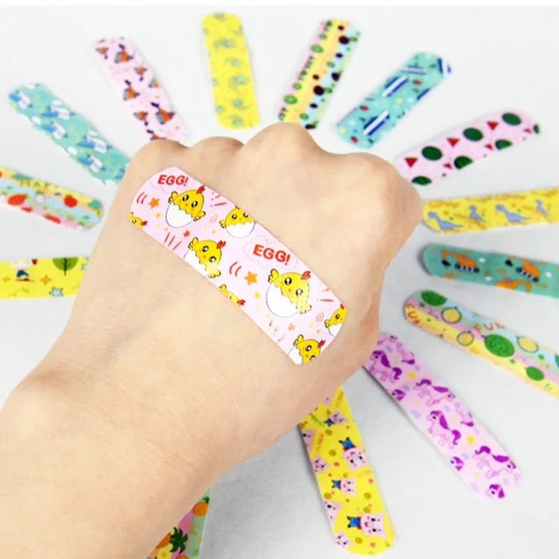 Woundplast Cartoon Band Aid para crianças Kawaii ferida emplastros, estampas aleatórias dos desenhos animados, patches de pele para crianças, primeiros socorros, 100pcs por conjunto